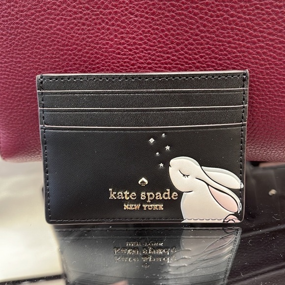 Kate Spade Bunbun Bunny Small Slim Card Holder Wallet

COLOR:
Black Multi
NWT - Picture 13 of 16